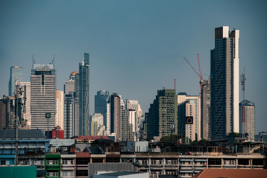 Stunning view of Bangkok's modern skyscrapers under a clear blue sky, perfect for travel inspiration.