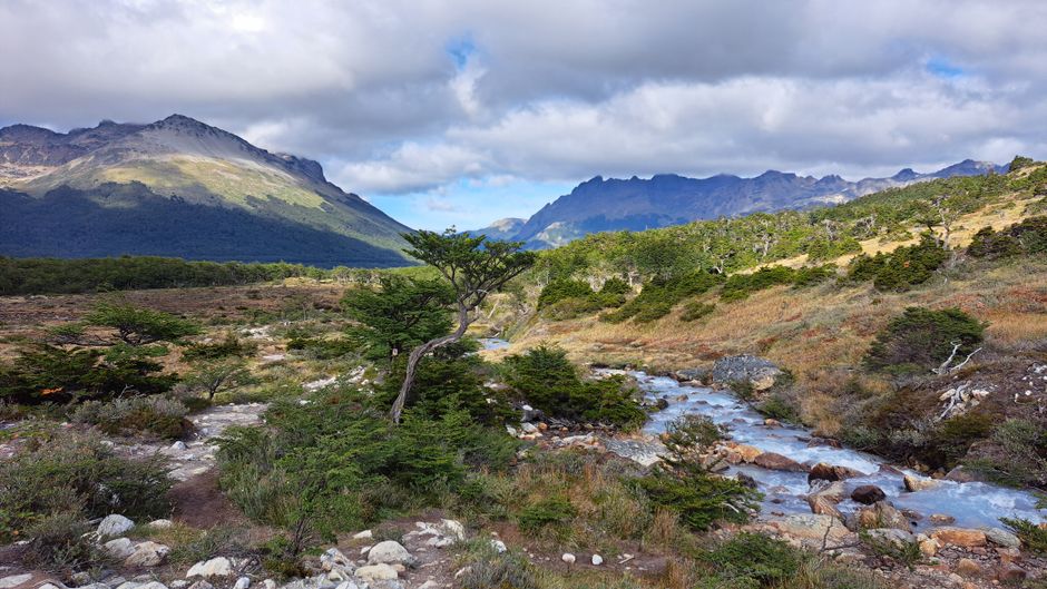 Stunning mountain landscape with river in Tierra del Fuego, Argentina.